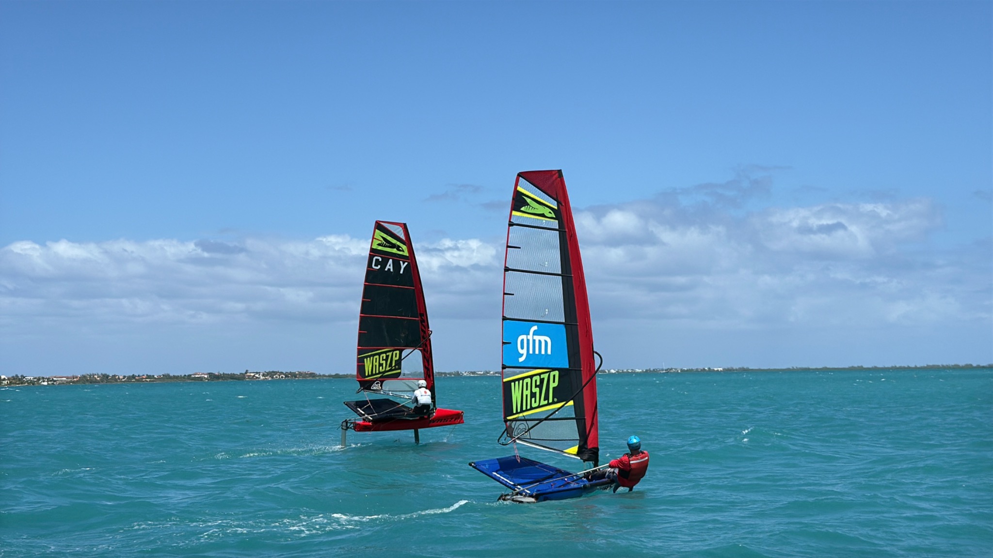 WASZP sailors foiling in Grand Cayman