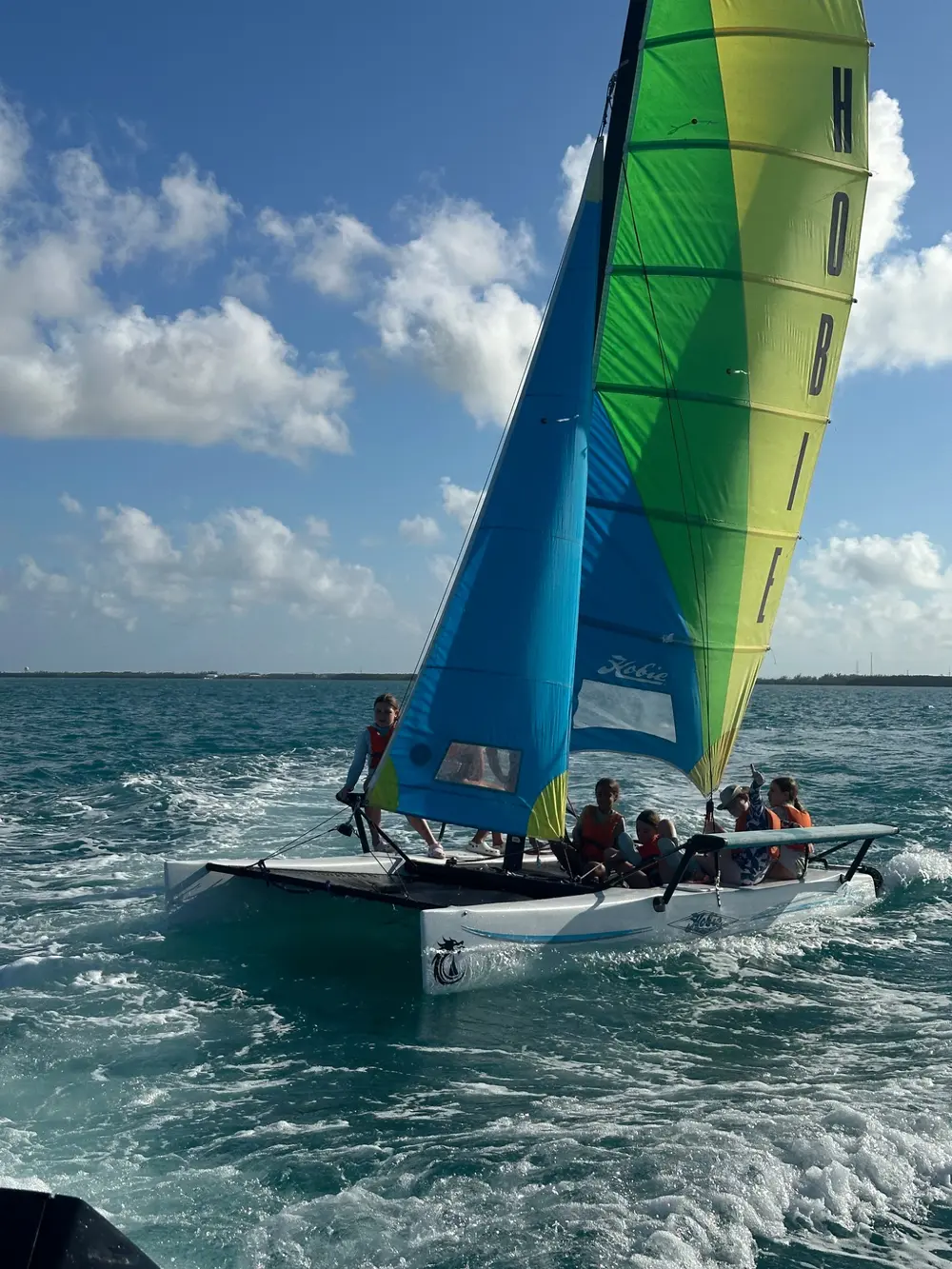 Young sailors enjoying Dragon Bay